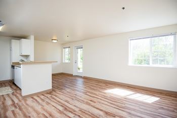 Faux wood plank flooring in select homes